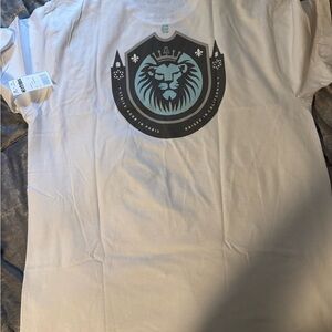 Etnies White T-Shirt with Lion Crest Design